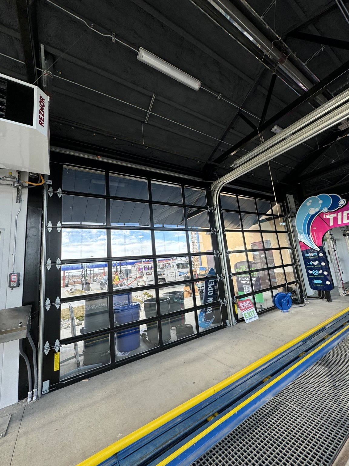 Full view glass door installation by LiftX Door Systems
