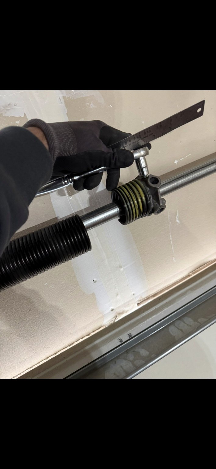 Broken spring repair service by LiftX Door Systems